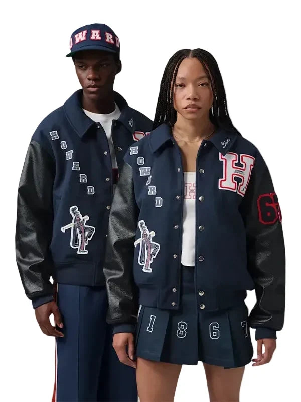 Two models wearing matching navy blue varsity jackets with black leather sleeves, featuring 'HARVARD' lettering and sports graphics, posed against a solid gray background.